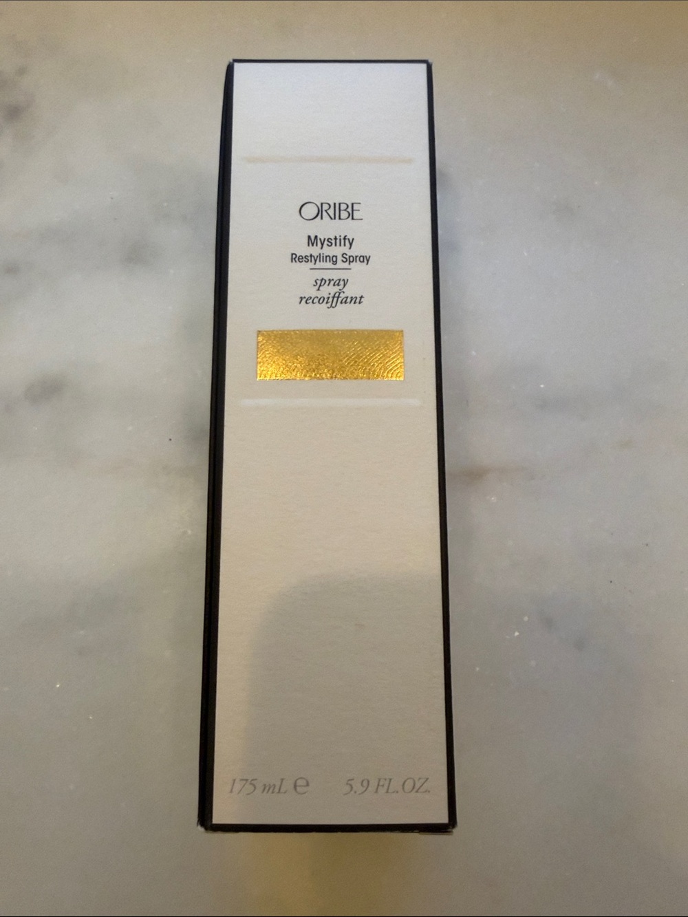Oribe Mystify Restyling Spray — White & Gold Packaging